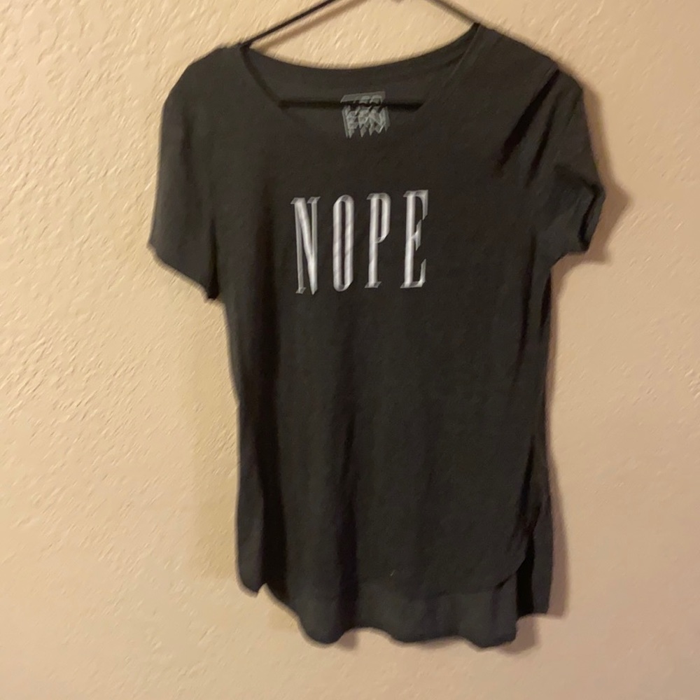 Woman’s “NOPE” shirt